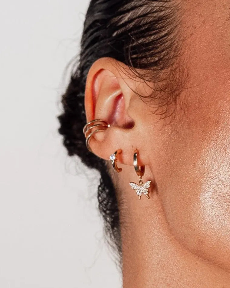 Bella C Hoop Studs styled on ear – 18k gold-filled with CZ stone