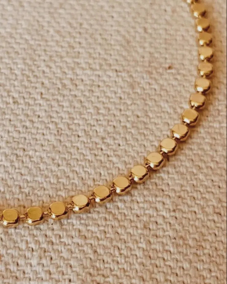 Close-up of IGGI Jewellery Dotted Dainty Bracelet featuring gold-filled dot design.