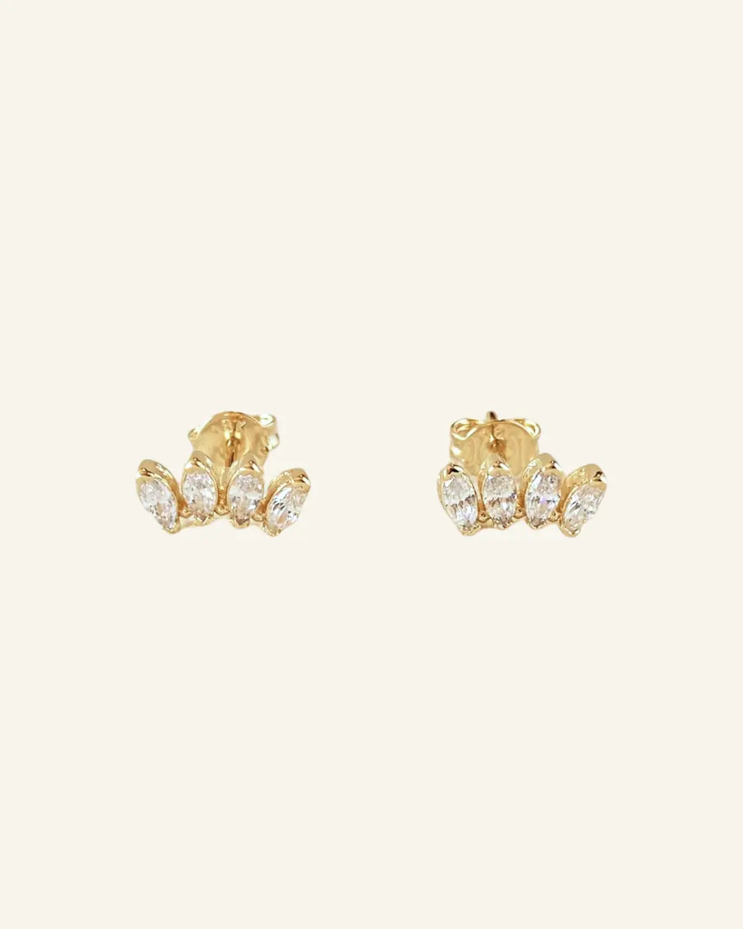 Cluster Curved Stud Earrings in 18k gold-filled with marquise stones on neutral background