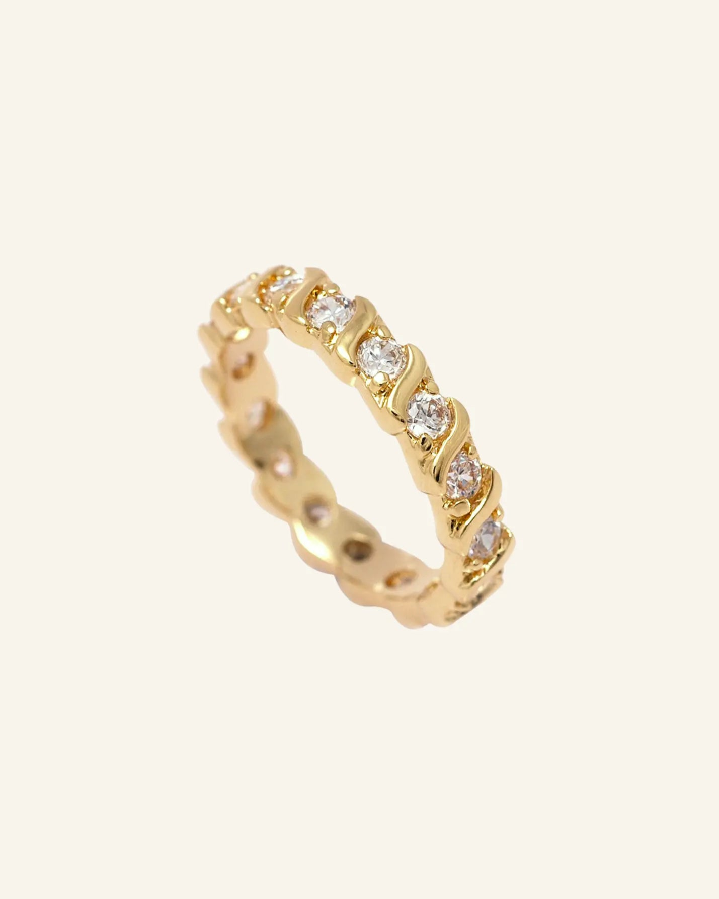 Donella Ring – 18k gold-filled band with CZ stones on neutral background
