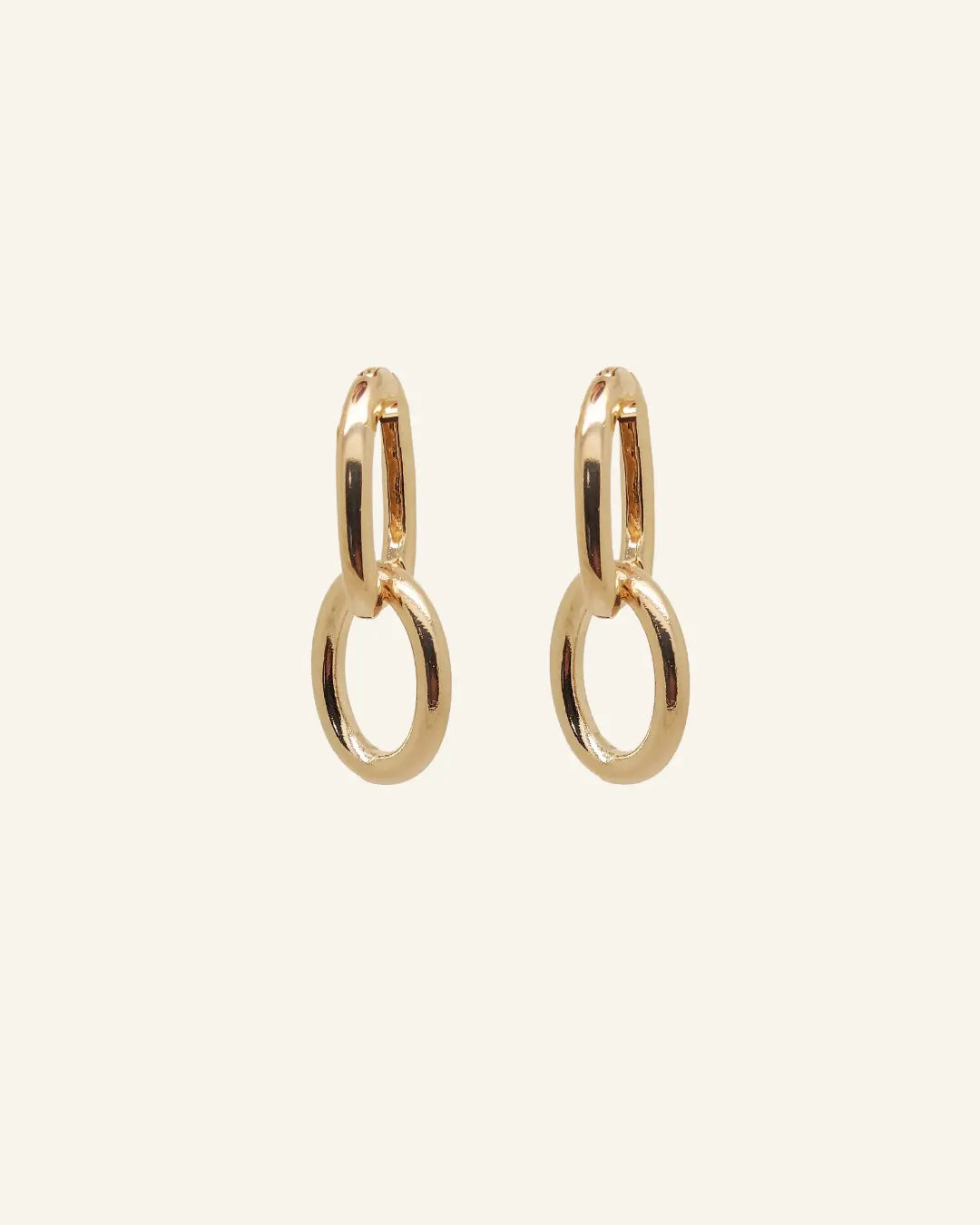 Double Paperclip Hoops by IGGI Jewellery – interlocking 18k gold-filled hoop earrings displayed on a neutral background.
