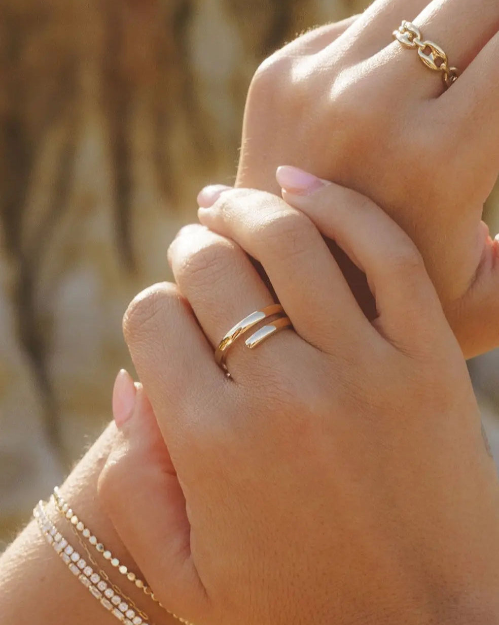 Etta Ring styled on hand with layered IGGI Jewellery rings.