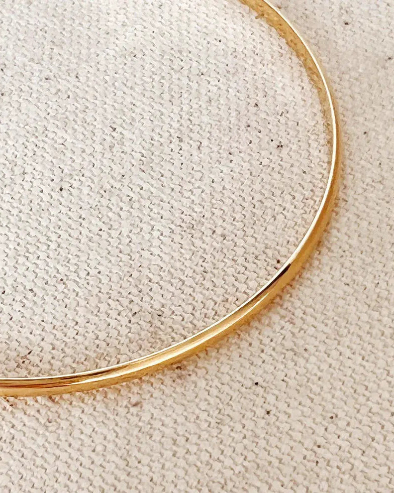 Close-up of Fine Gold Bangle - 18k gold-filled bracelet by IGGI Jewellery