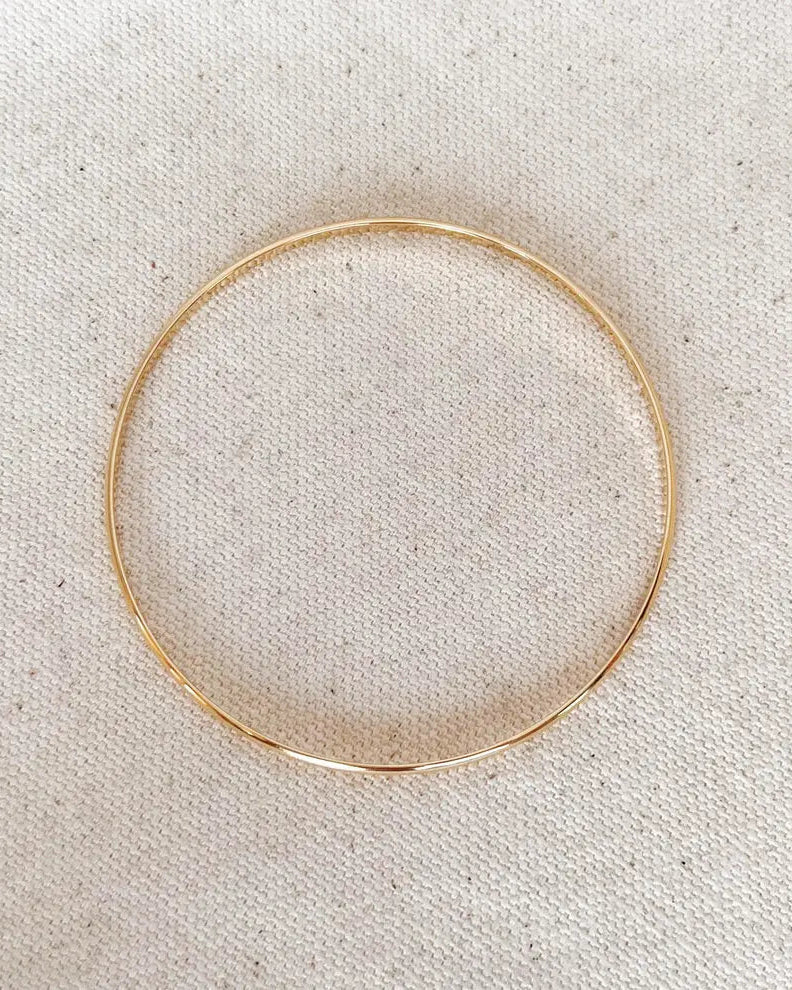 Fine Gold Bangle flat lay - gold-filled minimal bracelet by IGGI Jewellery