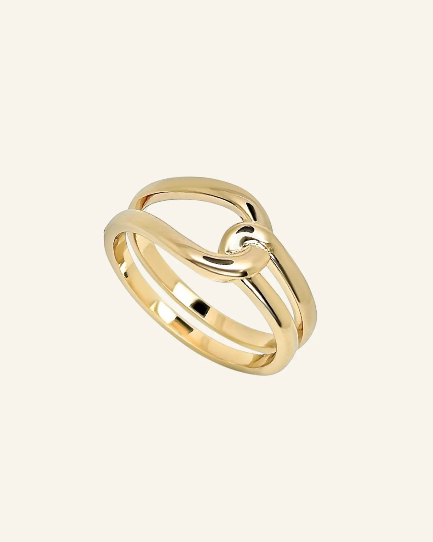 Gwen Ring crafted in 18k gold-filled metal featuring a bold sculptural design with a smooth dome shape and polished finish on a neutral background