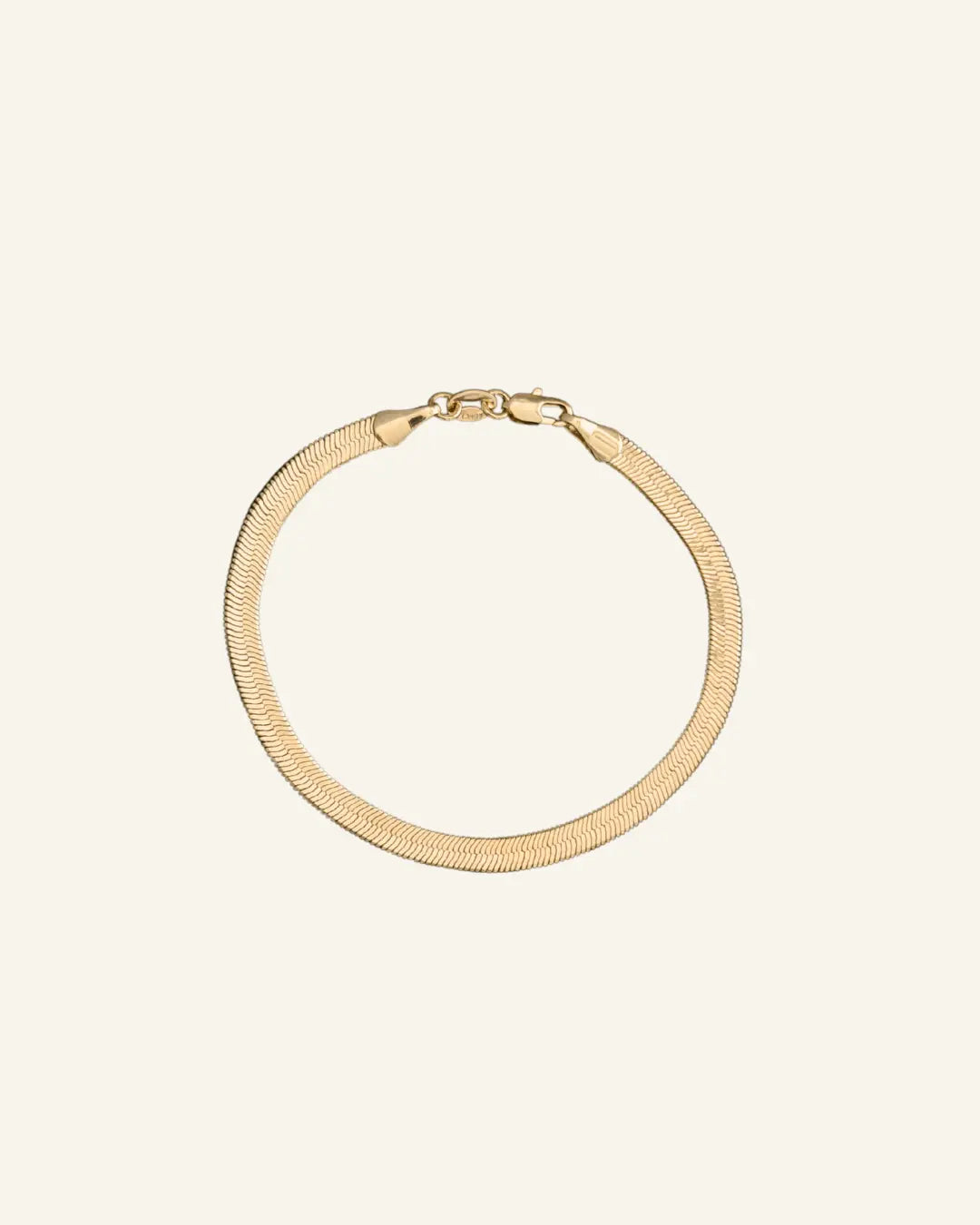 Herringbone Chain Bracelet 4mm in 18k gold-filled, flat interlocking links with a smooth liquid-gold finish, designed by IGGI Jewellery.
