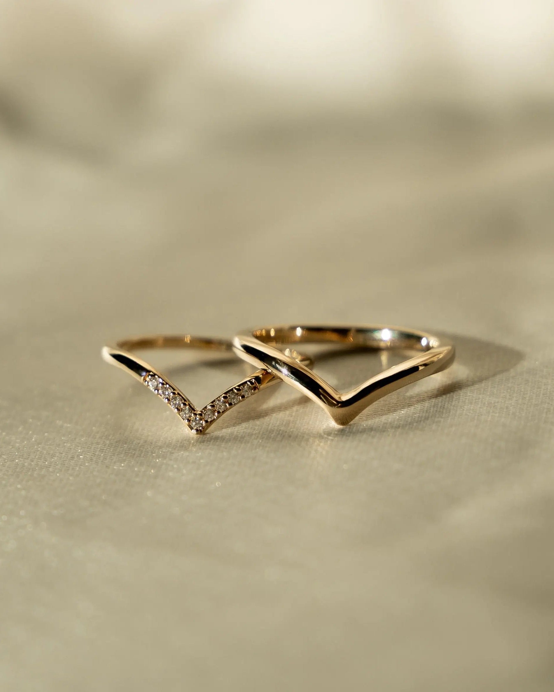 Lexi Ring on soft neutral fabric showcasing its V-shaped detail