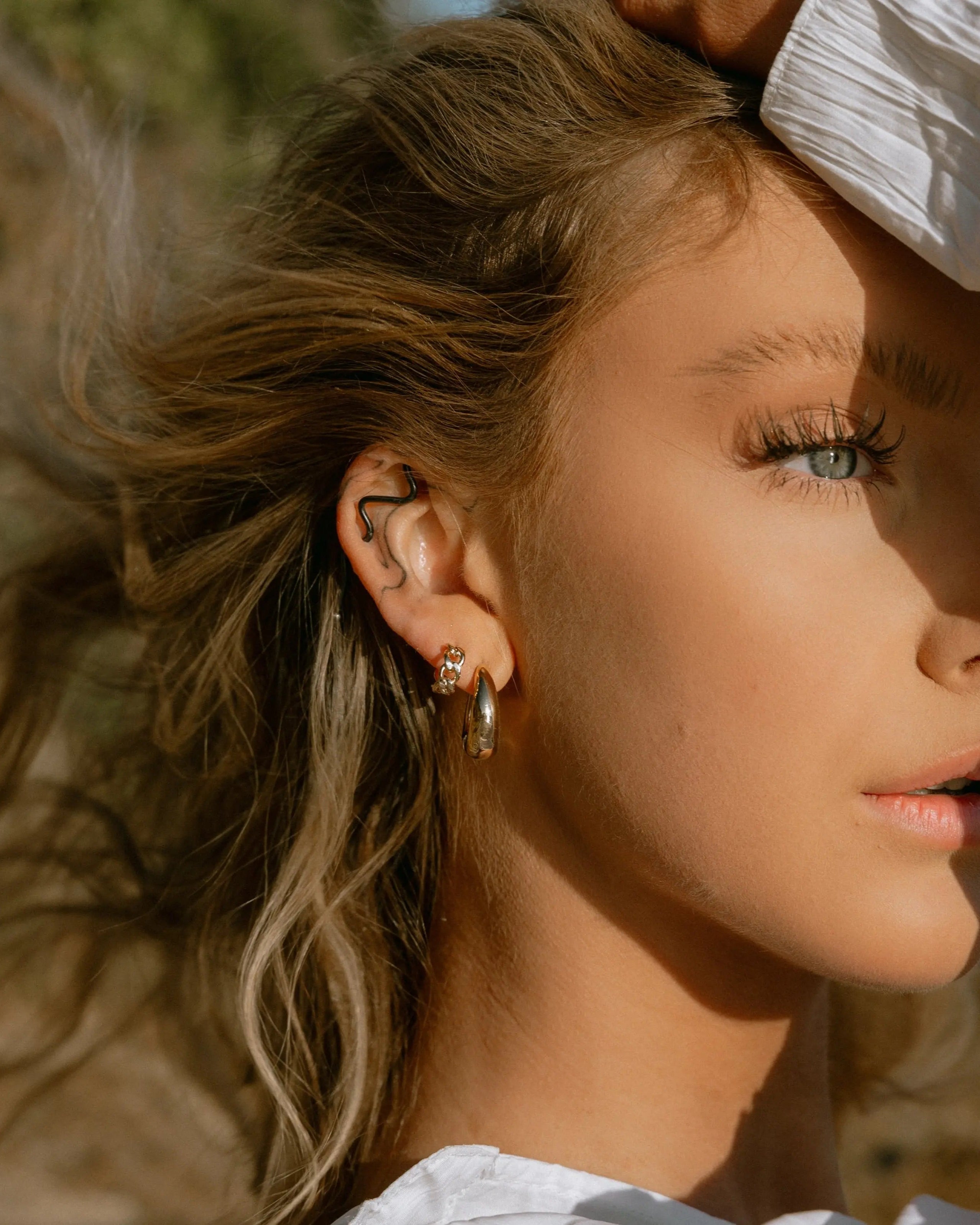 Side angle view of Mona Drop Hoops - IGGI Jewellery 18k Gold-Filled Earrings