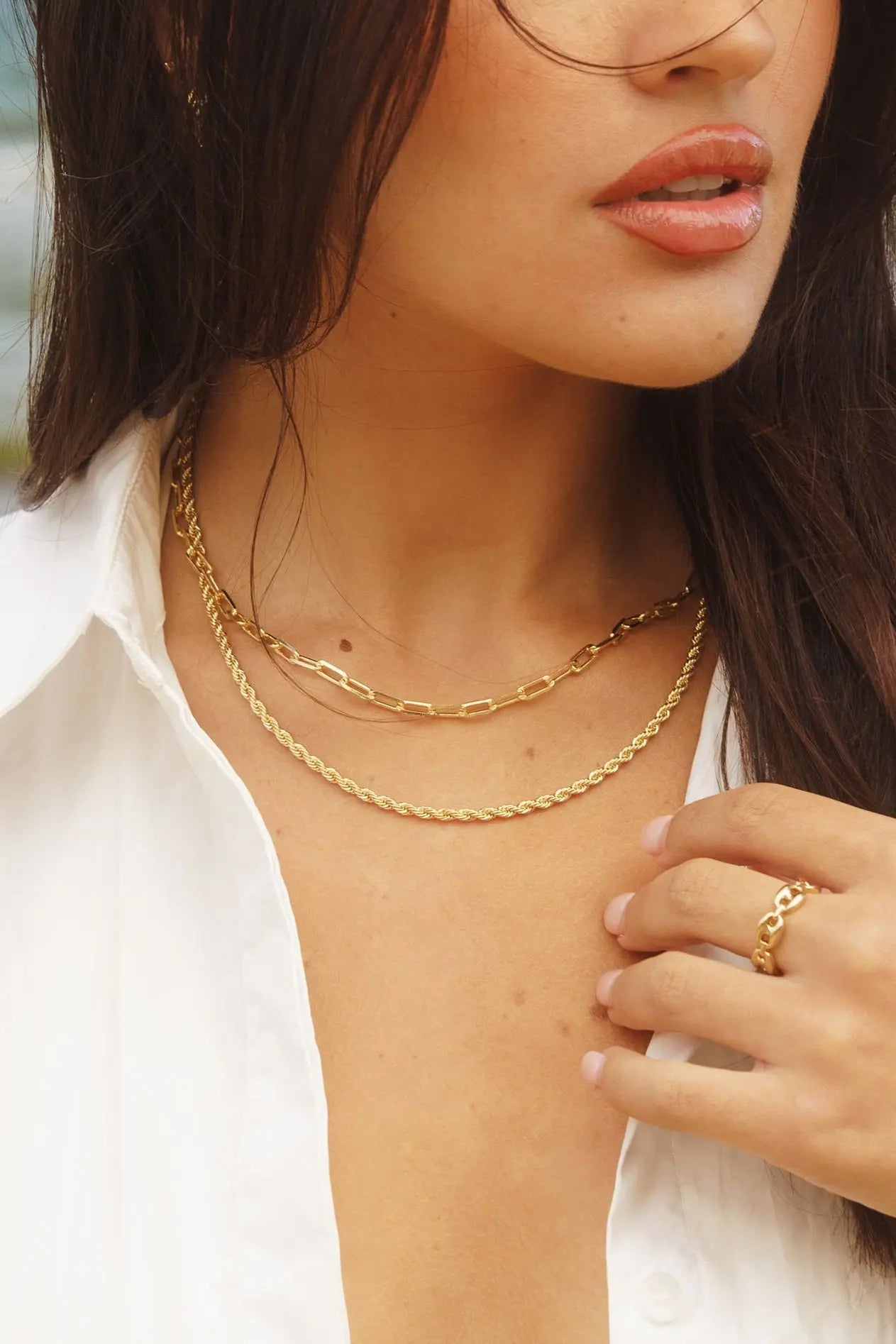Close-up of model wearing 18k gold-filled paperclip chain necklace – minimal styling