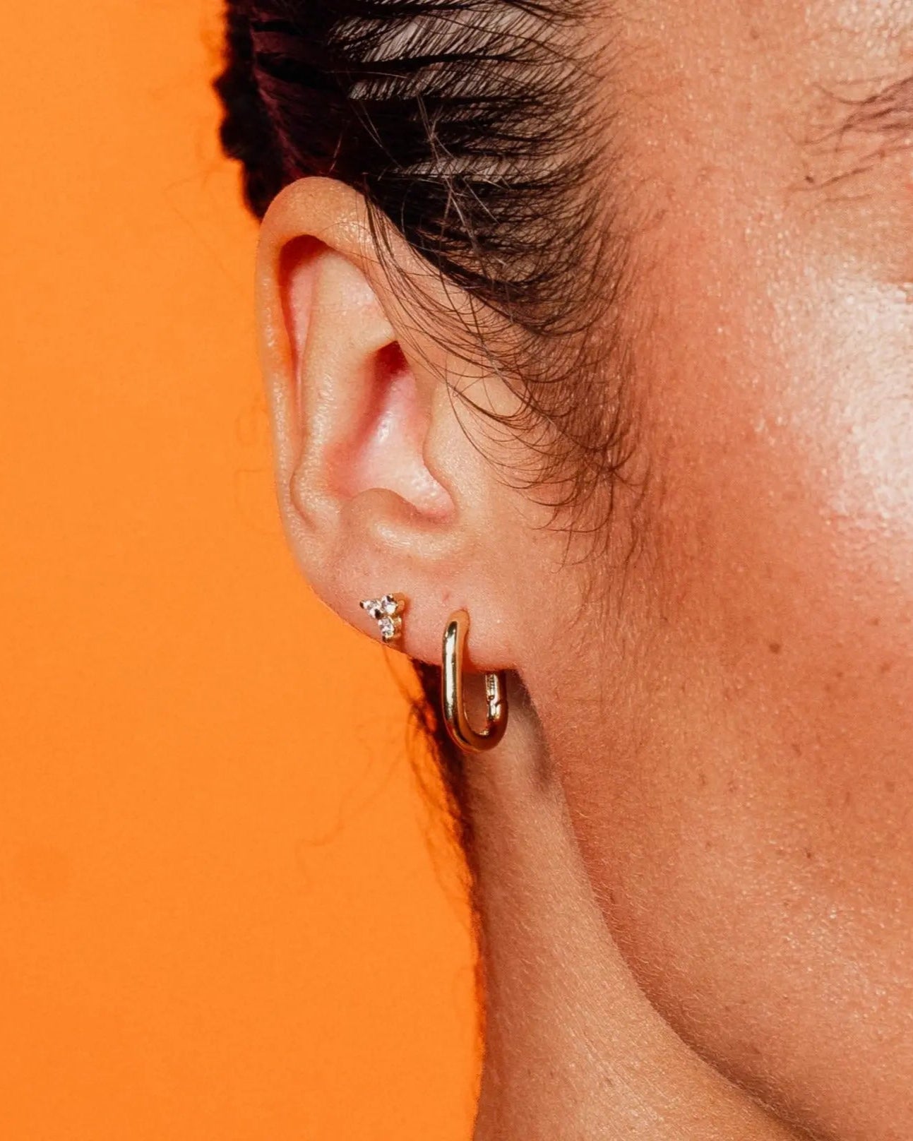 Paperclip Huggie Hoops styled on ear - IGGI Jewellery