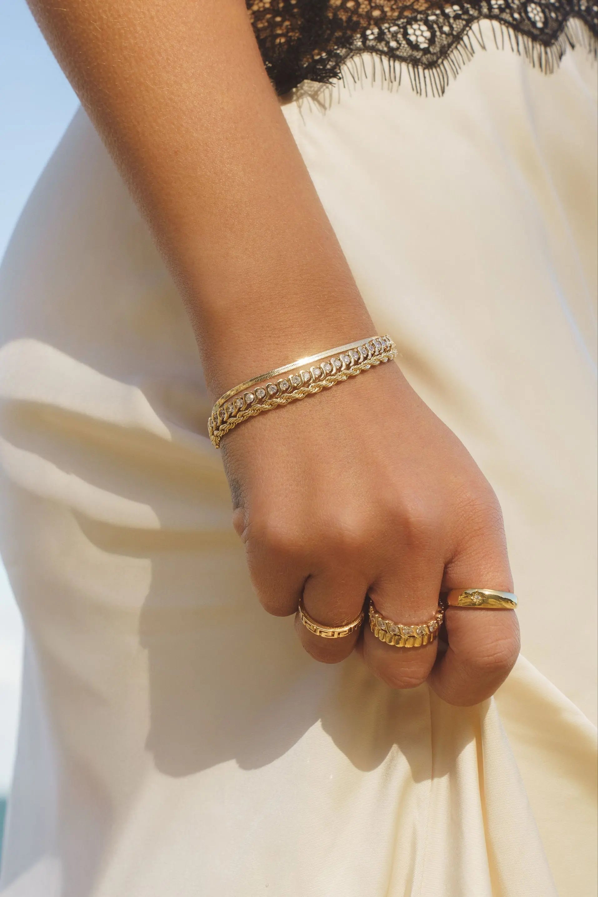 Rope Chain Bracelet styled with gold rings for a chic, everyday look by IGGI Jewellery.