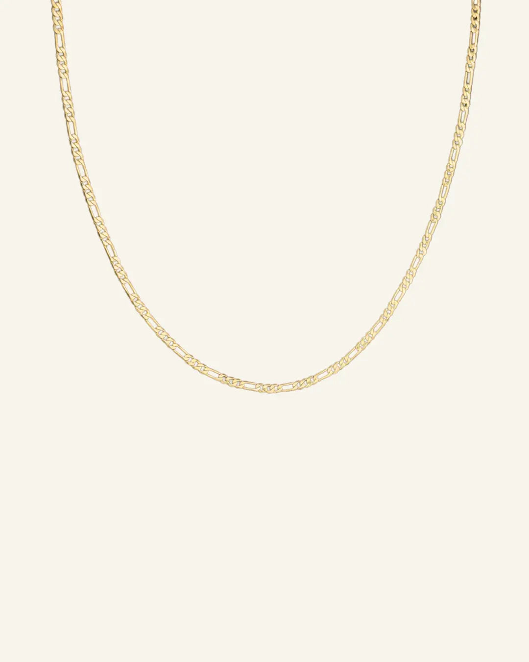 Thin Flat Figaro Chain Necklace in 18k gold-filled displayed flat on neutral background