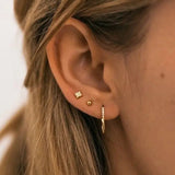 Model wearing Everyday Ball Studs in 18k gold-filled – close-up side view