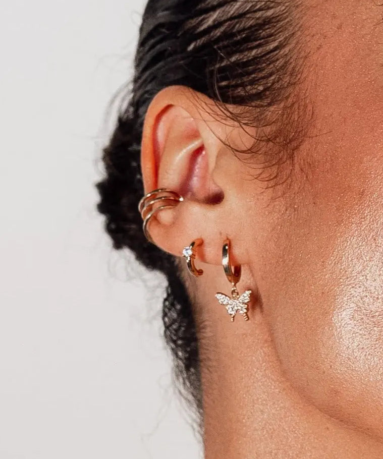 Bella C Hoop Studs styled on ear – 18k gold-filled with CZ stone