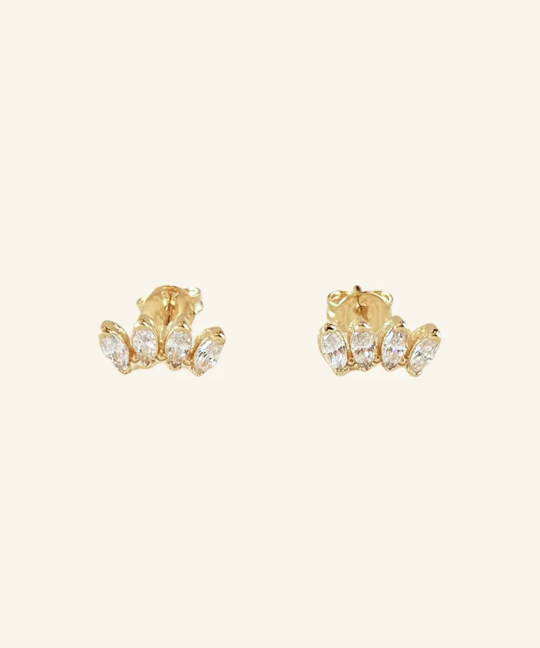Cluster Curved Stud Earrings in 18k gold-filled with marquise stones on neutral background