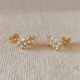 Cluster Curved Stud Earrings in 18k gold-filled displayed on soft fabric