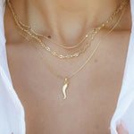 Cornicello Horn Pendant layered with gold chains – IGGI Jewellery