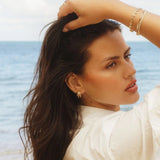 Cove Drop Earrings styled on ear - IGGI Jewellery
