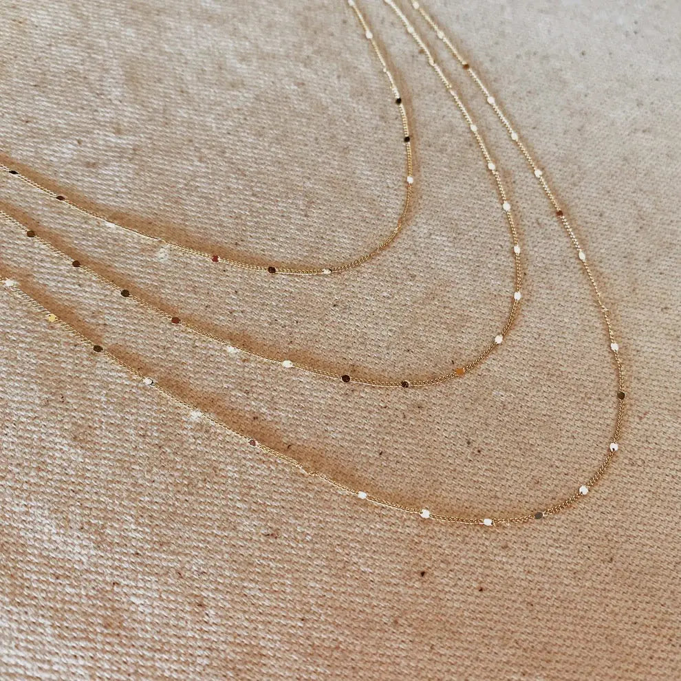 Close-up detail of Curb Pressed Chain Necklace showing polished gold curb links