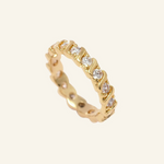 Donella Ring – 18k gold-filled band with CZ stones on neutral background