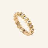 Donella Ring – 18k gold-filled band with CZ stones on neutral background