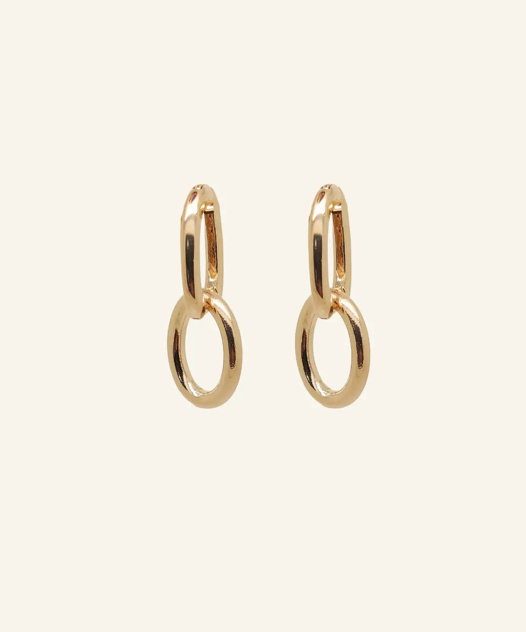 Double Paperclip Hoops by IGGI Jewellery – interlocking 18k gold-filled hoop earrings displayed on a neutral background.