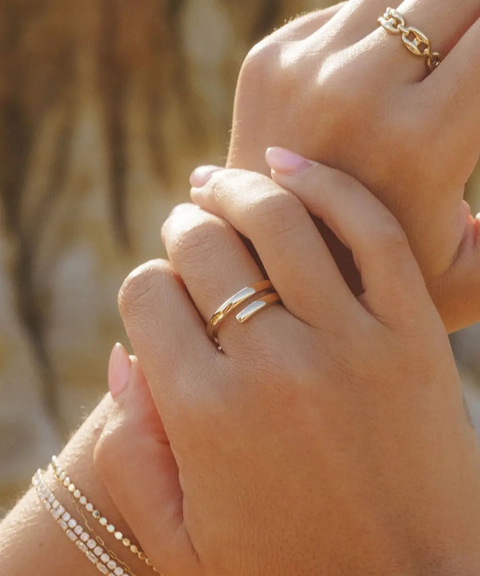 Etta Ring styled on hand with layered IGGI Jewellery rings.