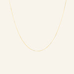 Extra dainty 18k gold-filled box chain necklace flatlay