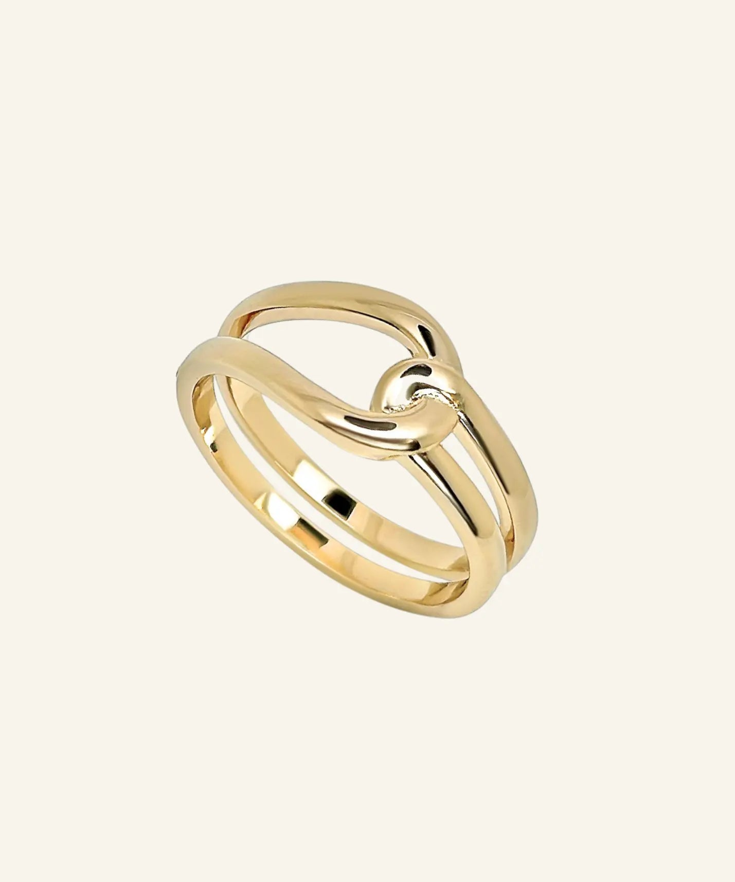 Gwen Ring crafted in 18k gold-filled metal featuring a bold sculptural design with a smooth dome shape and polished finish on a neutral background