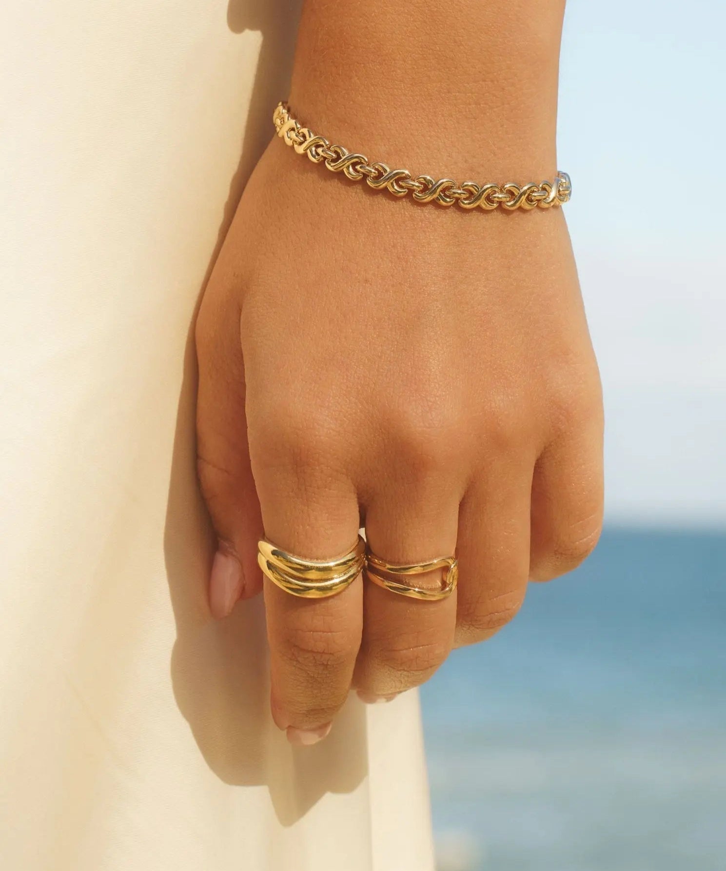 Halona Ring styled on hand, bold dome design in 18k gold-filled finish