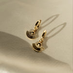 Heka Hoops 18k gold-filled hoop earrings styled on fabric
