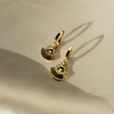 Heka Hoops 18k gold-filled hoop earrings styled on fabric