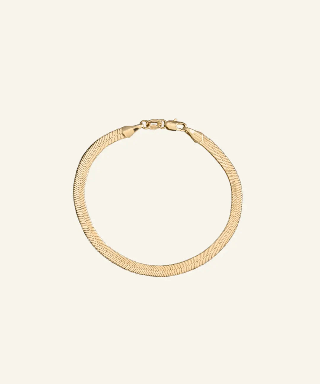 Herringbone Chain Bracelet 4mm in 18k gold-filled, flat interlocking links with a smooth liquid-gold finish, designed by IGGI Jewellery.