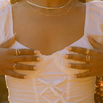 Side view of Lara Ring worn on hand