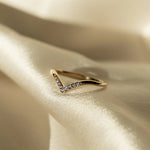 Lexi Ring styled on hand with sunlight highlighting the details