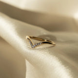 Lexi Ring styled on hand with sunlight highlighting the details