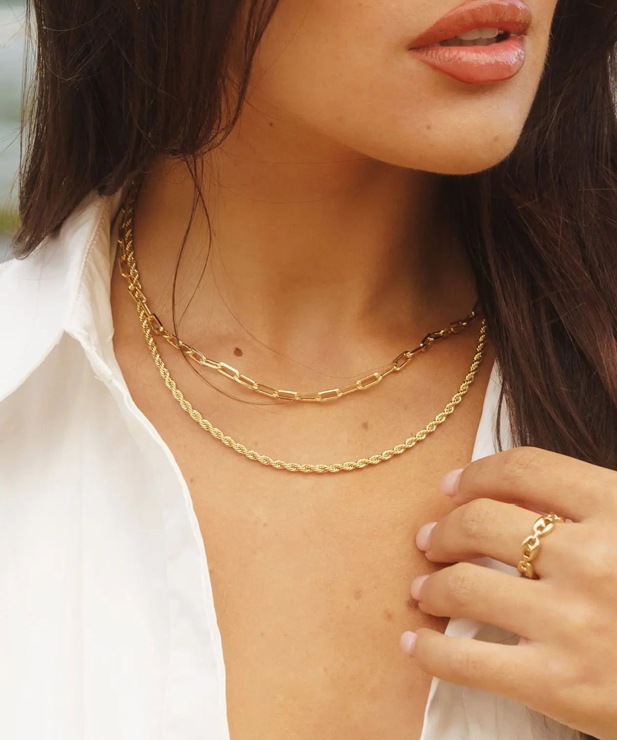 Close-up of model wearing 18k gold-filled paperclip chain necklace – minimal styling