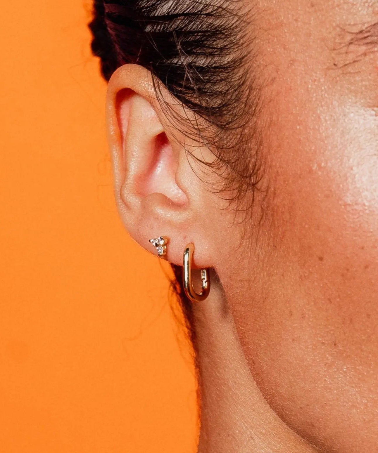 Paperclip Huggie Hoops styled on ear - IGGI Jewellery