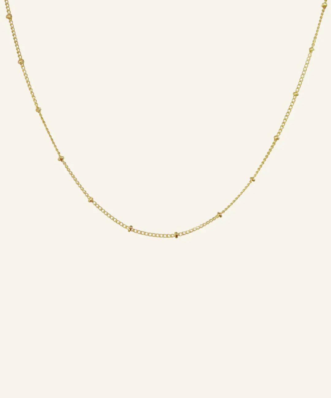 Satellite Ball Chain Necklace flatlay showing 18k gold-filled chain with dainty satellite beads