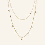 Star Drop Necklace in 18k gold-filled displayed flat on a neutral background