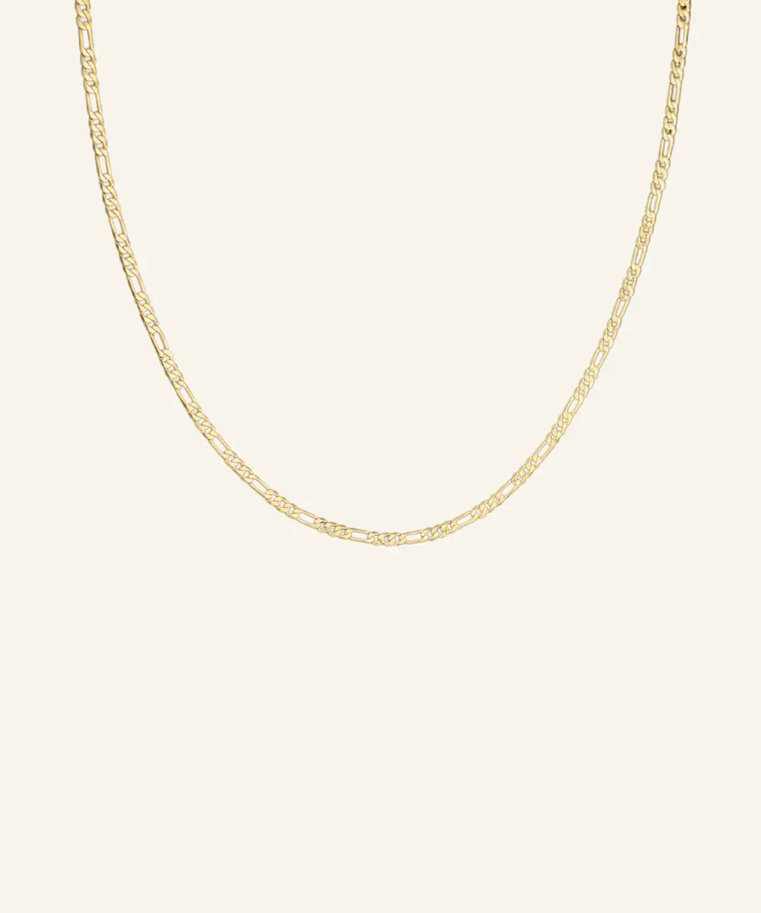 Thin Flat Figaro Chain Necklace in 18k gold-filled displayed flat on neutral background