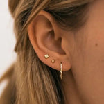 Model wearing Everyday Ball Studs in 18k gold-filled – close-up side view