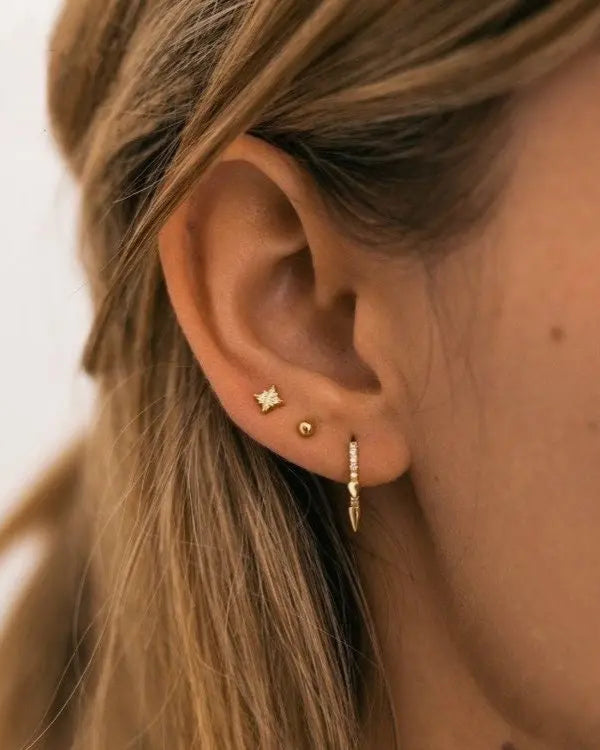 Model wearing Everyday Ball Studs in 18k gold-filled – close-up side view